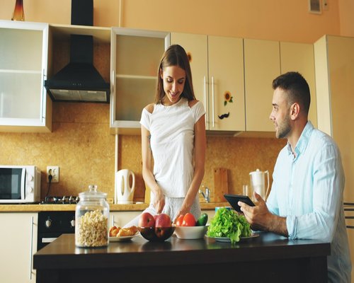 Couple eating healthy meal together